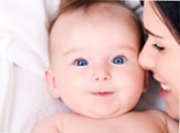 Smiling baby with Mother